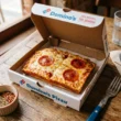 Aposta da Domino's Transforma Seu Próprio Logo em Pizza Individual